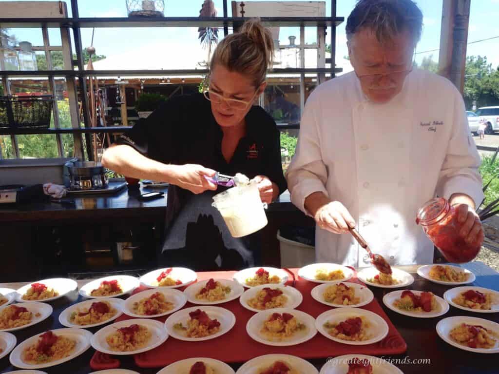 A woman and man prepare dessert.