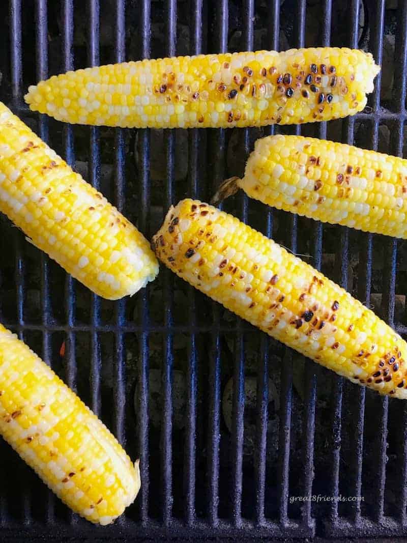 This spicy grilled corn is the best addition to any summer night barbecue! Make this corn on the grill or in the oven for the perfect side dish!