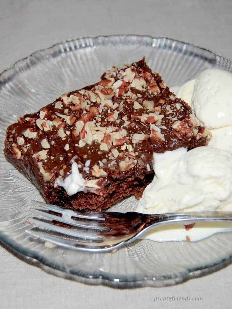 This Texas Sheet Cake is the "just sweet enough" dessert to feed a hungry crowd. Simple to make and the perfect chocolate cake dessert for any party!