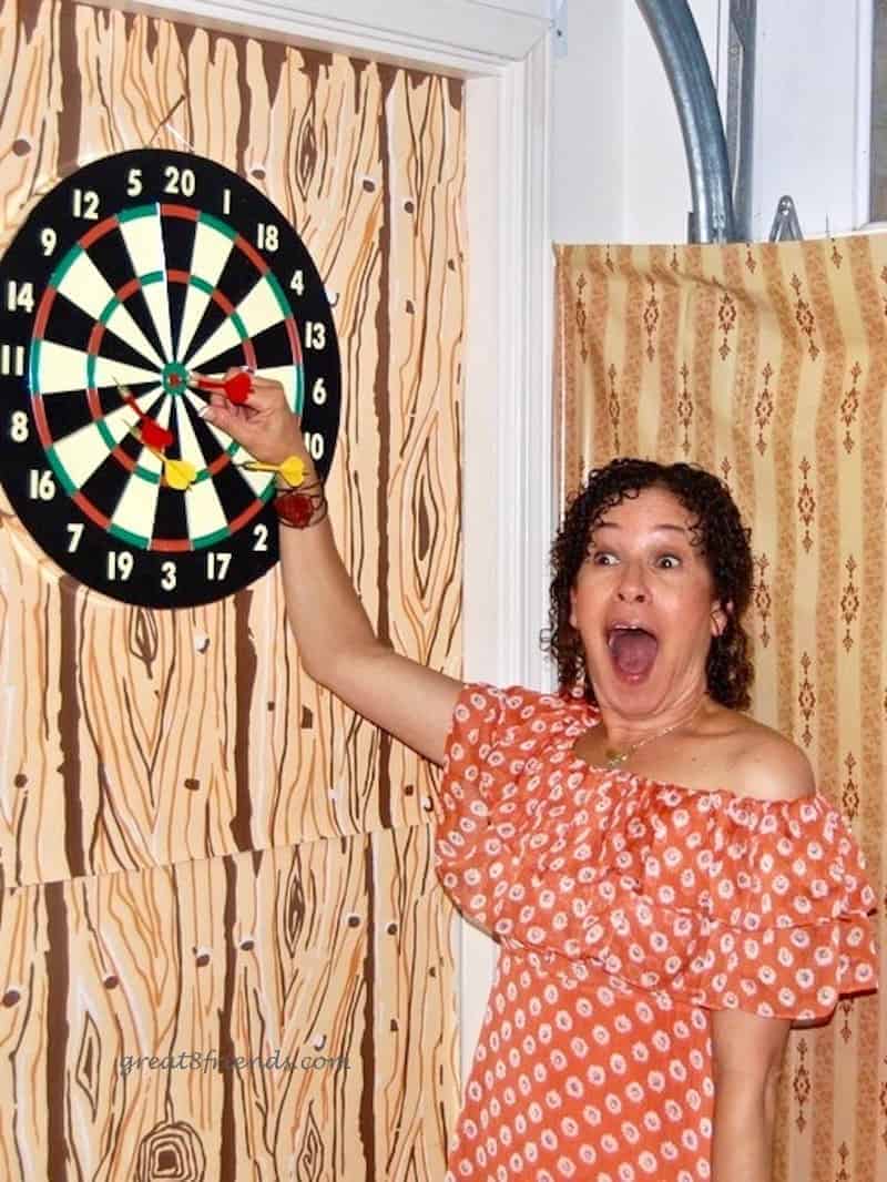 Debbie so happy after she won the dart game.