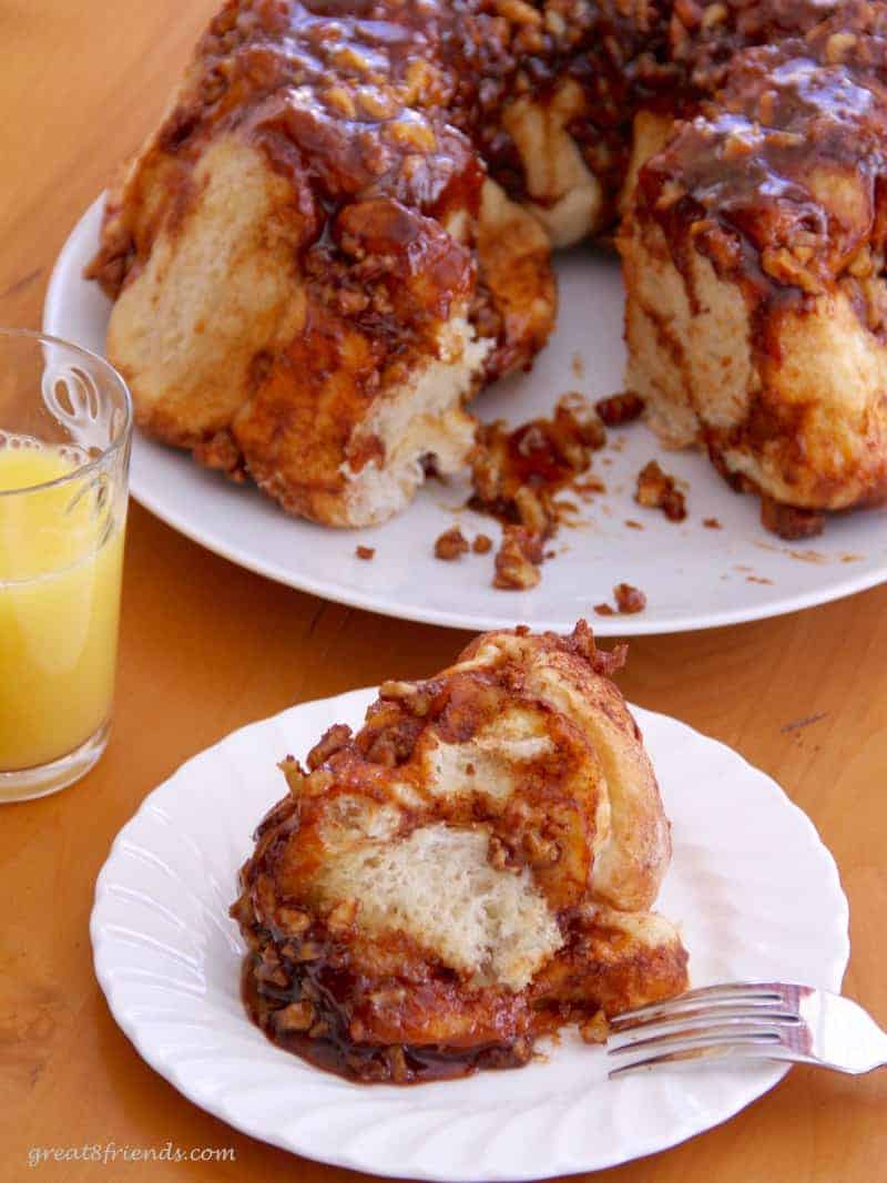 A cut piece of easy sticky buns (monkey bread) for served for breakfast.