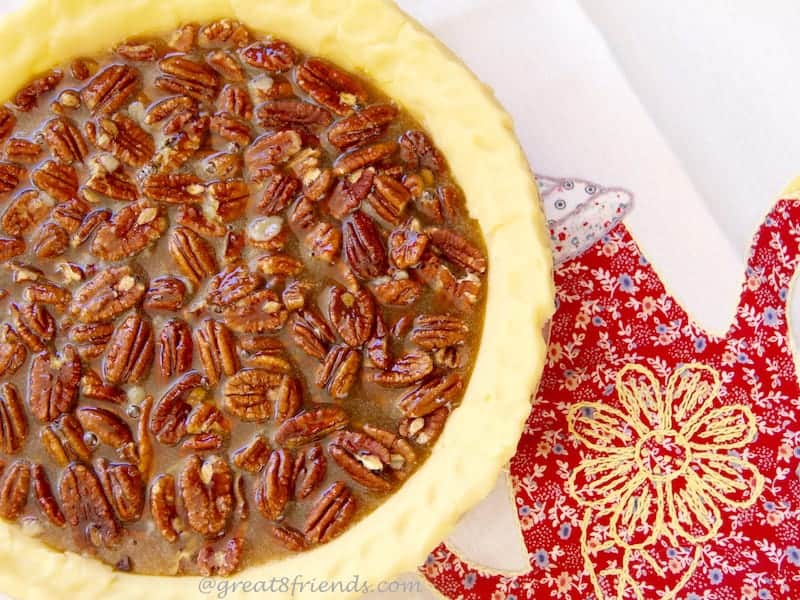 You say you don't like pecan pie? Well, this Chocolate Pecan Bourbon Pie will change your ever lovin' mind, honey child! You will love this!