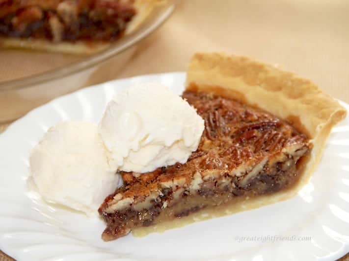 You say you don't like pecan pie? Well, this Chocolate Pecan Bourbon Pie will change your ever lovin' mind, honey child! You will love this!