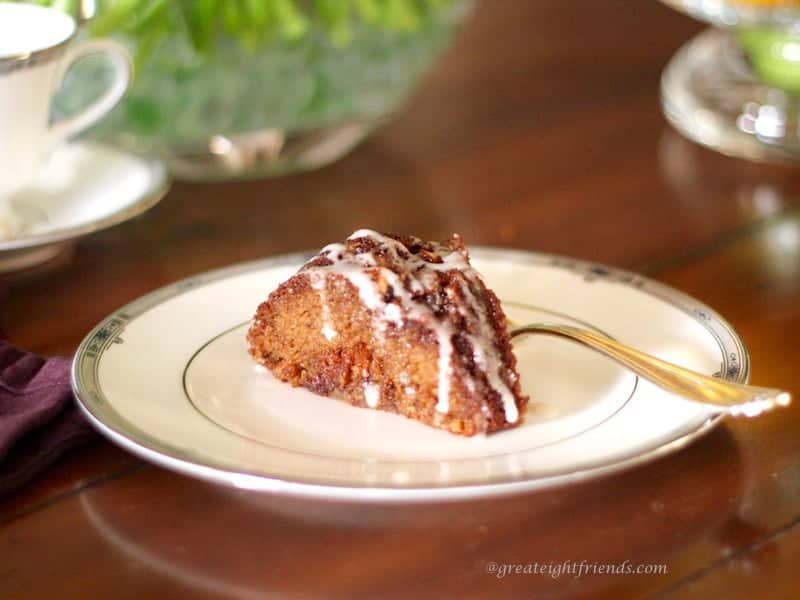 Cut piece of Cinnamon Coffee Cake on a plate. 