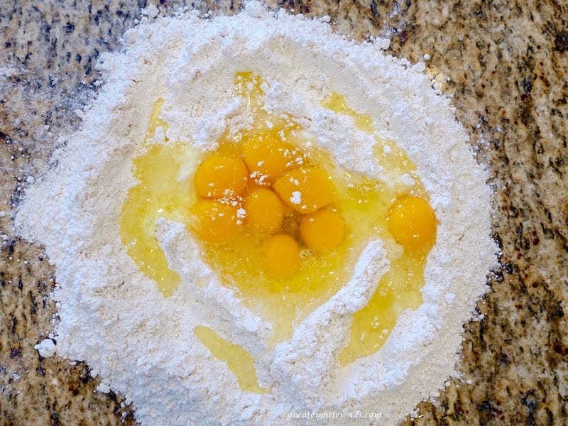 Flour with eggs in the center.