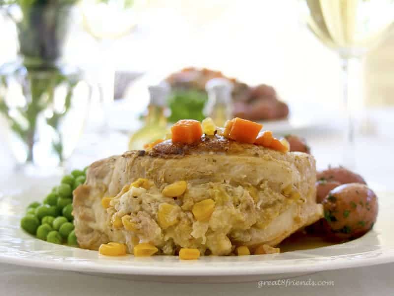 These Stuffed Pork Chops are the perfect company meal. They cook for an hour and a half, so you can enjoy your guests while this delicious meal cooks!