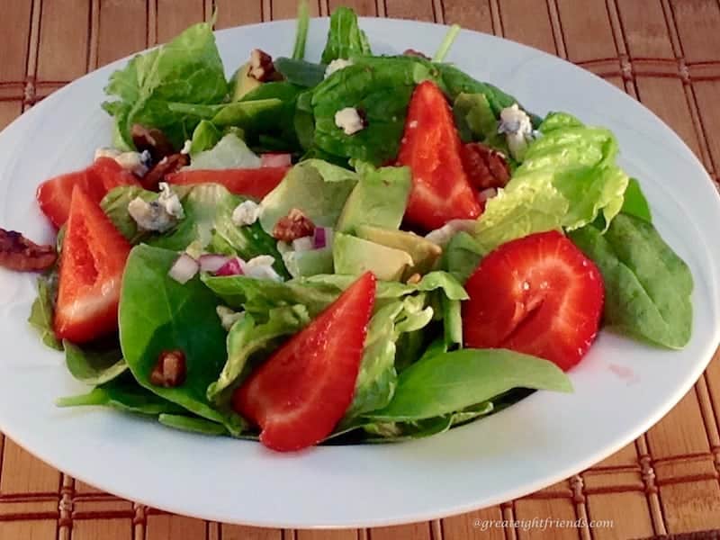 Strawberry Summer Salad with avocado blue cheese and walnuts