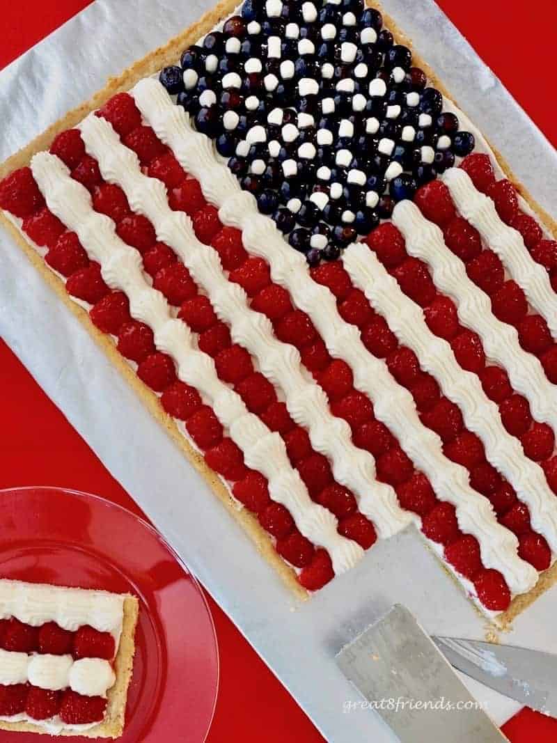 Overhead shot of a fruit pizza made to look like an American flag.