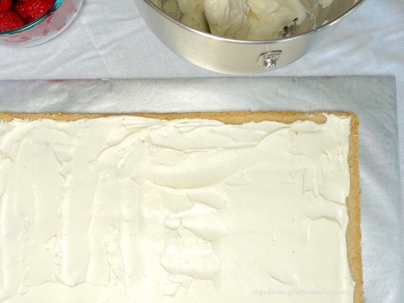 A rectangular crust spread with cheesecake mousse.