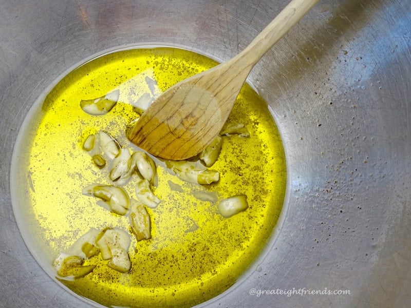 olive oil with garlic pieces