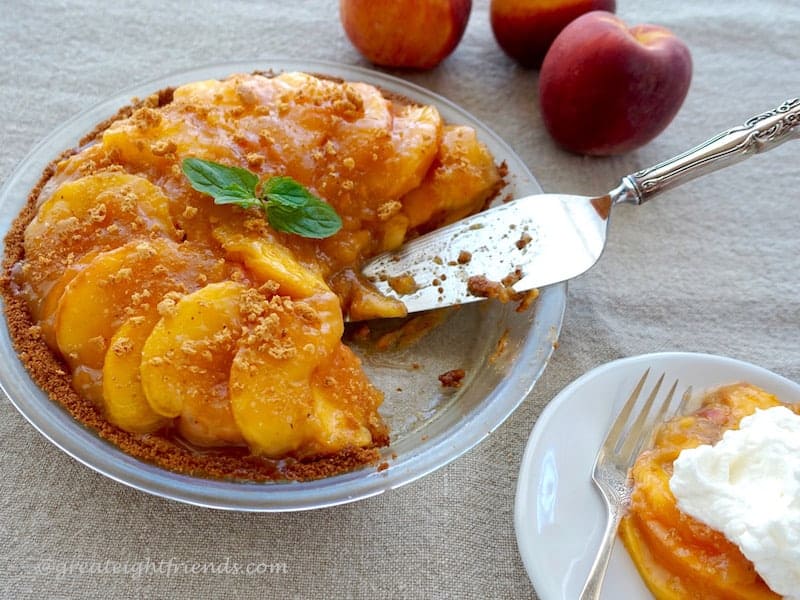 Peach Amaretti Pie with a slice removed.