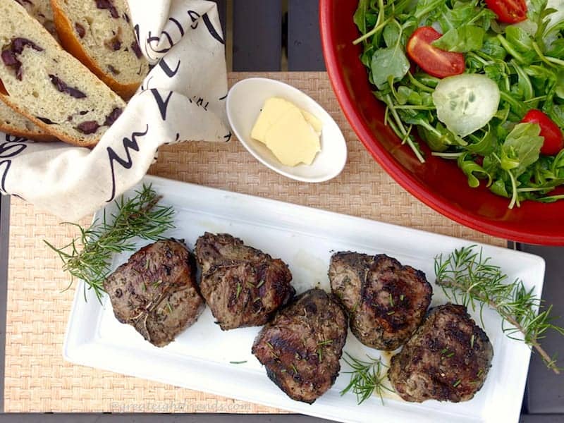 Grilled Lamb Chops on a rectangular platter.