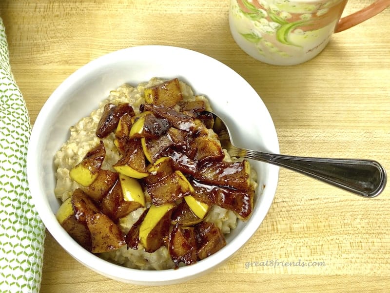 Apple Pie Oatmeal in bowl with spoon.