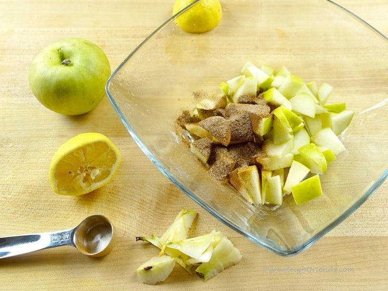 diced apples with spices on top.