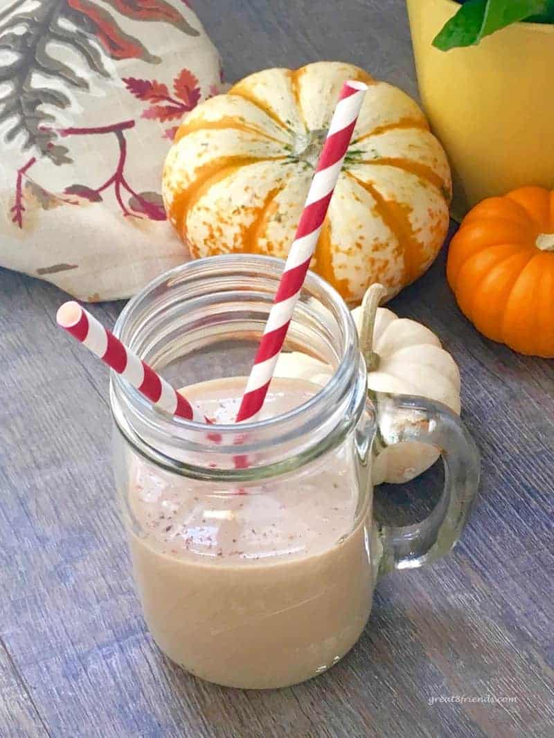 Irish Cream with pumpkin with two straws.