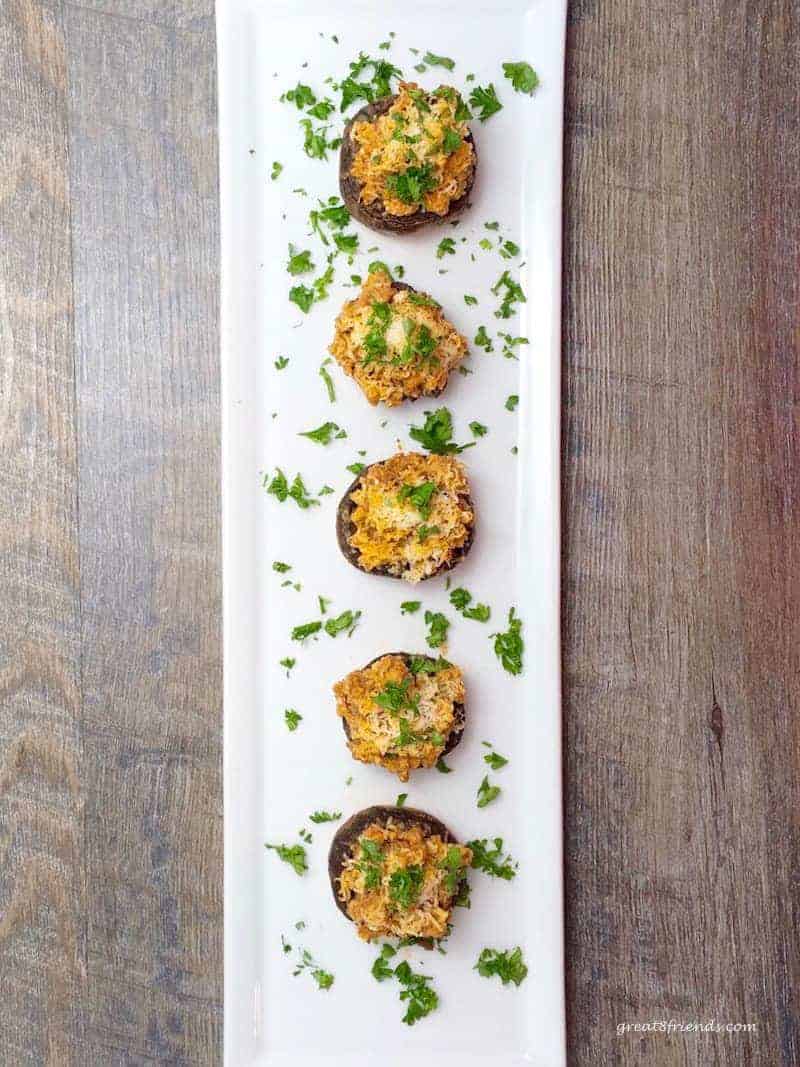 Sausage Stuffed Mushrooms on a plate. 