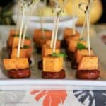 These Sweet Potato Squares can be made ahead of time and are the perfect hearty appetizer especially with the addition of sausage and a dipping sauce.