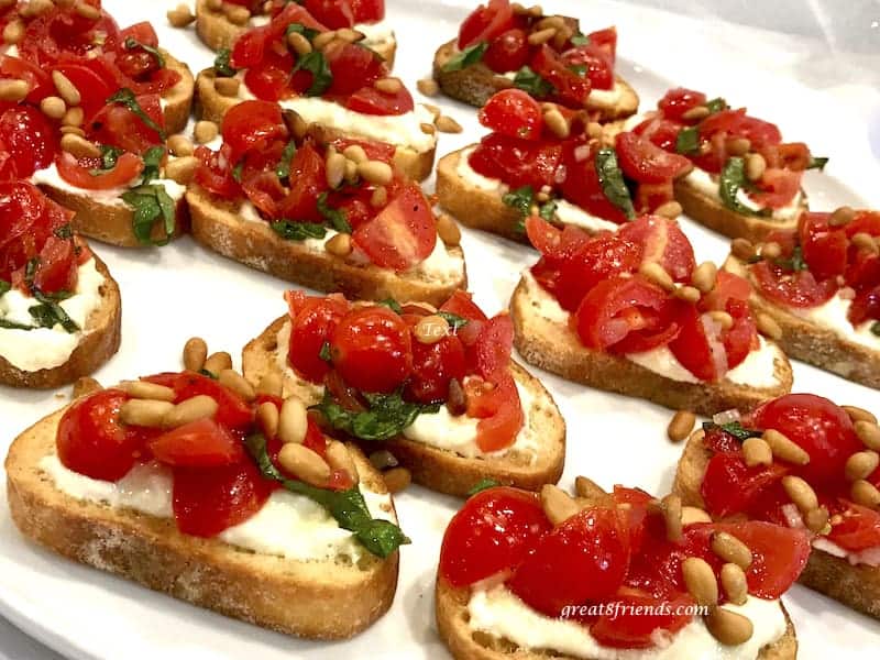 Tomato Crostini lined up ready to serve.