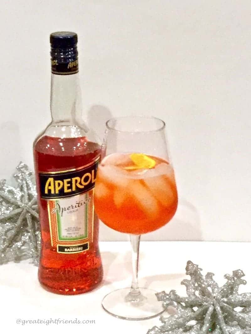 clink then drink aperol spritz