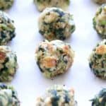 Super Simple Spinach Balls, the name says it all. Make these, freeze them, then you have the perfect appetizer ready to pop in the oven for any occasion.