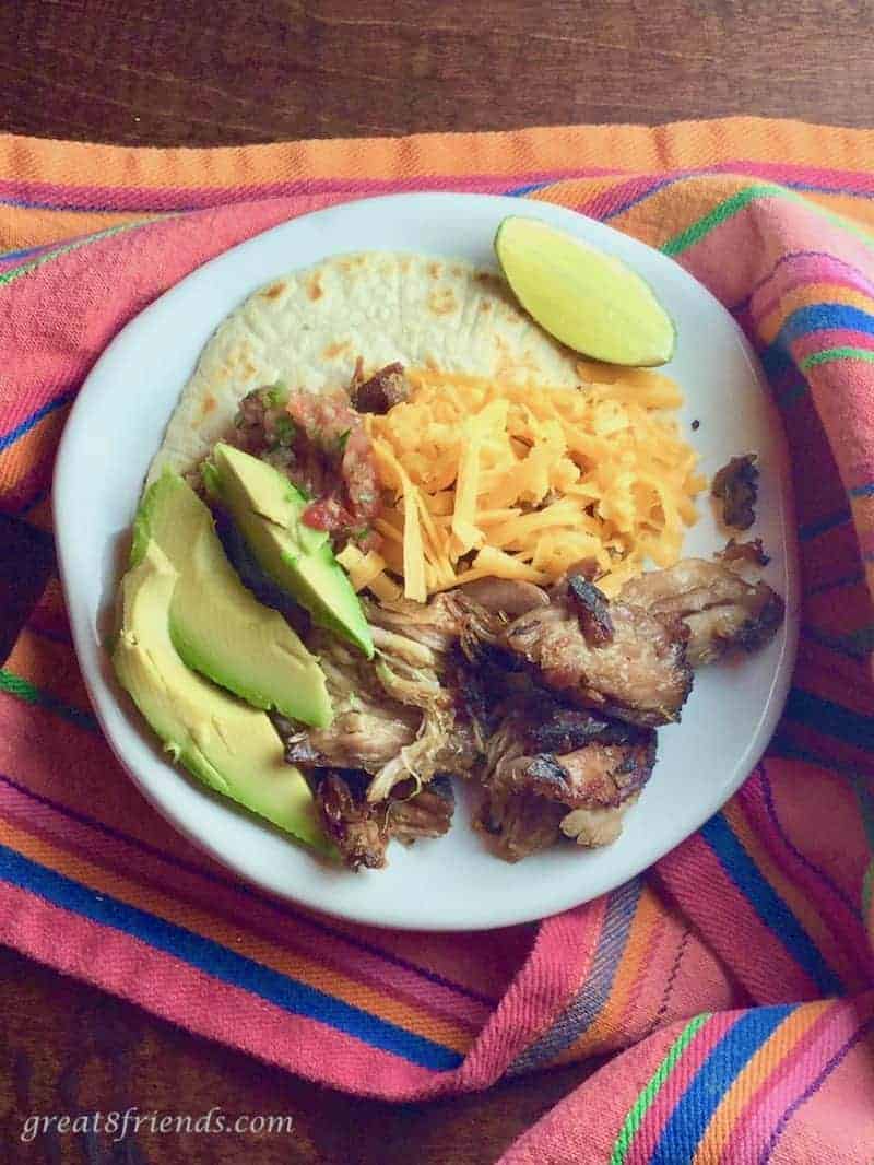 This Carnitas recipe is the tastiest and the easiest! Tasty because of the flavors of the oranges and herbs and easy because it cooks all day!