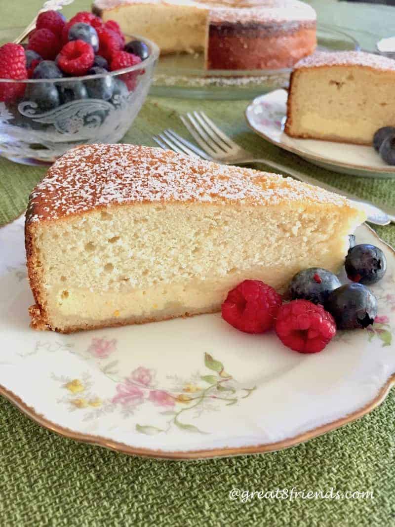 Close-up photo of a slice of Italian Ricotta Cake with berries.