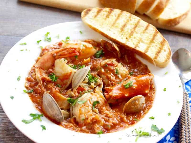 Attention seafood lovers! Enjoy this delicious Cioppino, a hearty seafood stew. It is a fish stew chock full of your favorite seafood and flavors.