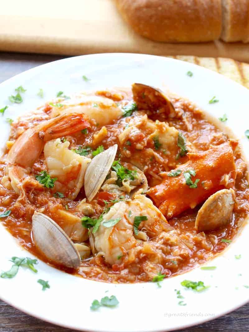 Attention seafood lovers! Enjoy this delicious Cioppino, a hearty seafood stew. It is a fish stew chock full of your favorite seafood and flavors.