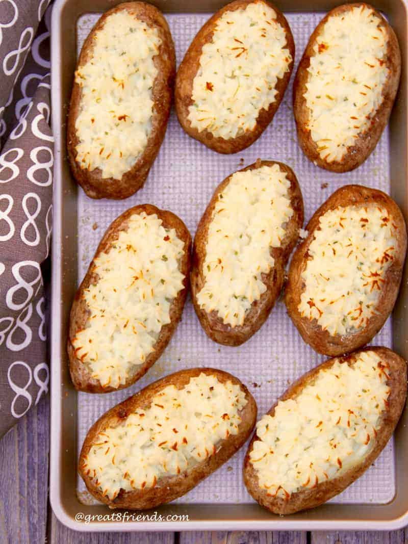 These twice baked potatoes include a creamy filling with goat cheese and scallions and twice baked creating a crisp outside shell.