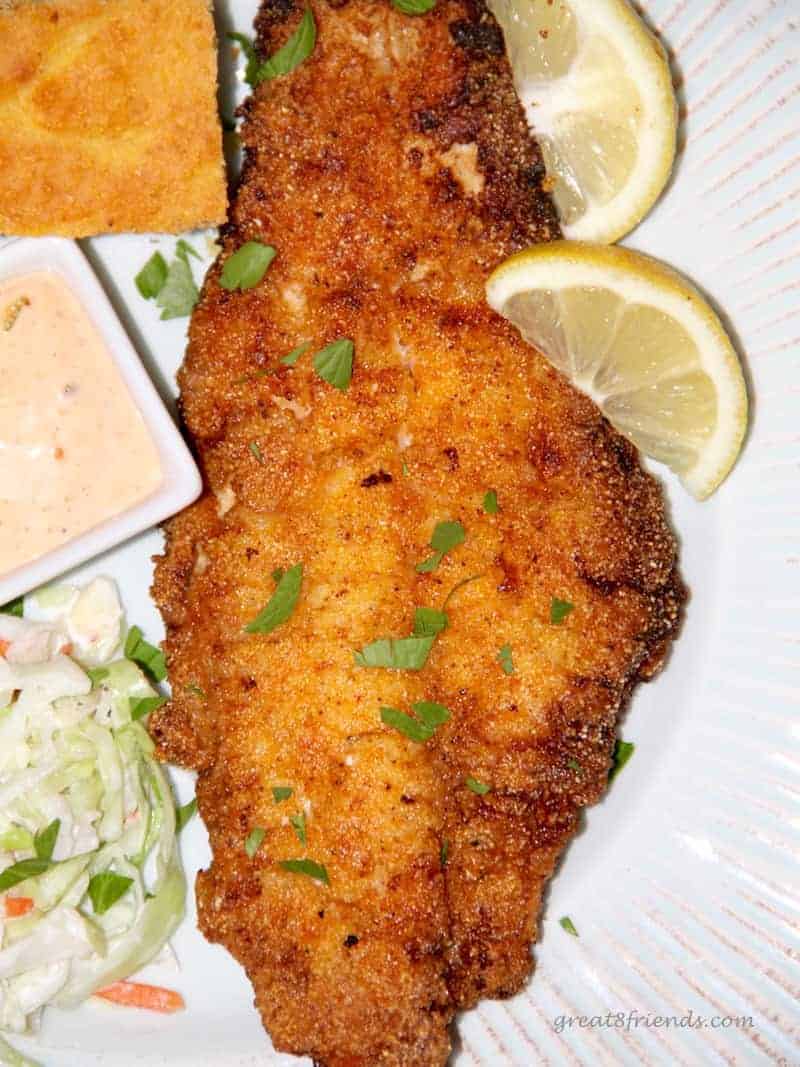 This spicy classic pan fried catfish has a great "kick" of flavor especially paired with the spicy tarter sauce. Serve as an entrée or appetizer!