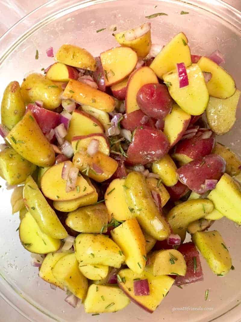 Cut up and seasoned potatoes.