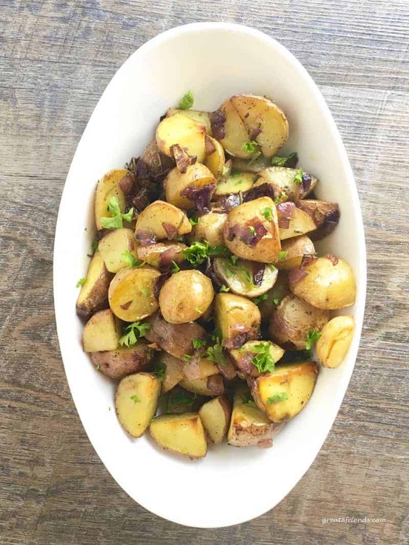 These Roasted Herbed Baby Potatoes are the perfect side dish for any beef, chicken, lamb or fish dish. A simple recipe with lots of flavor!