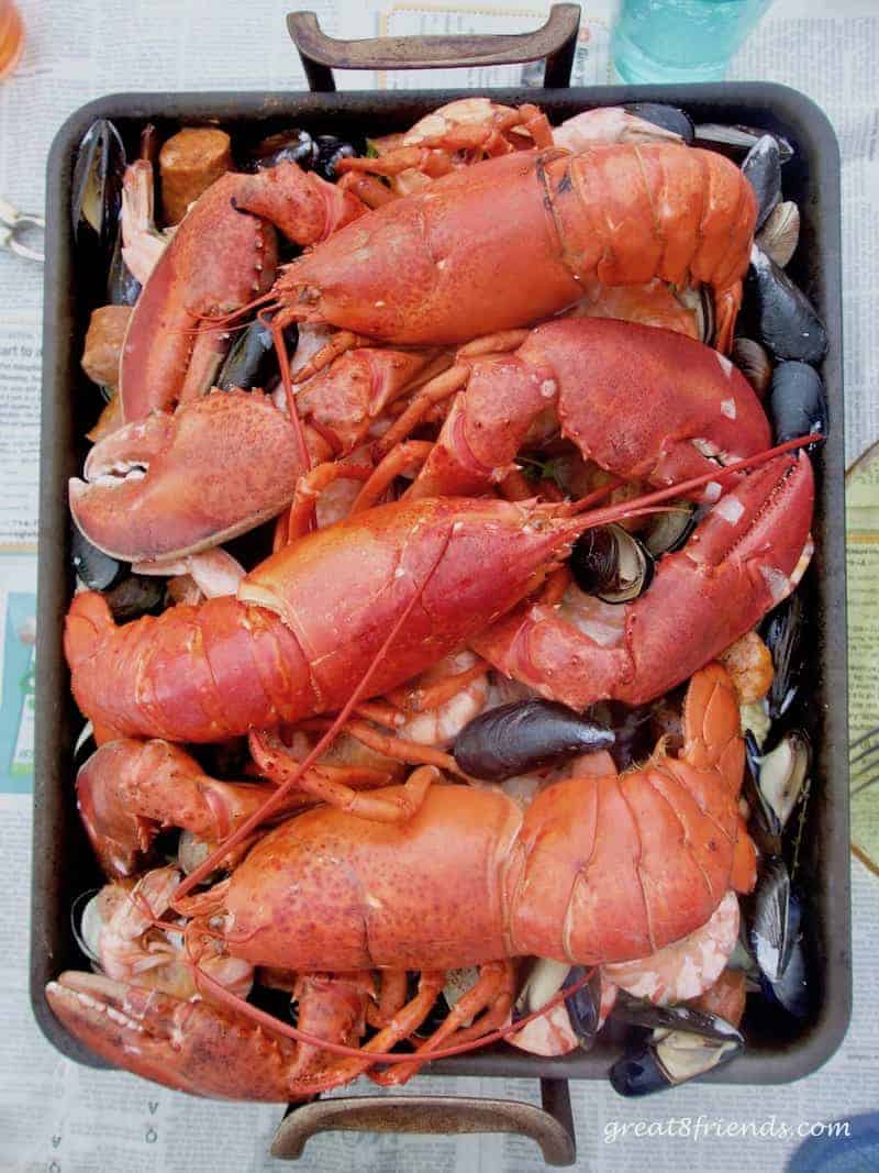 This Clambake on the Grill feeds a crowd and is an easy, casual summertime meal. And the mound of food in the middle of the table is impressive!