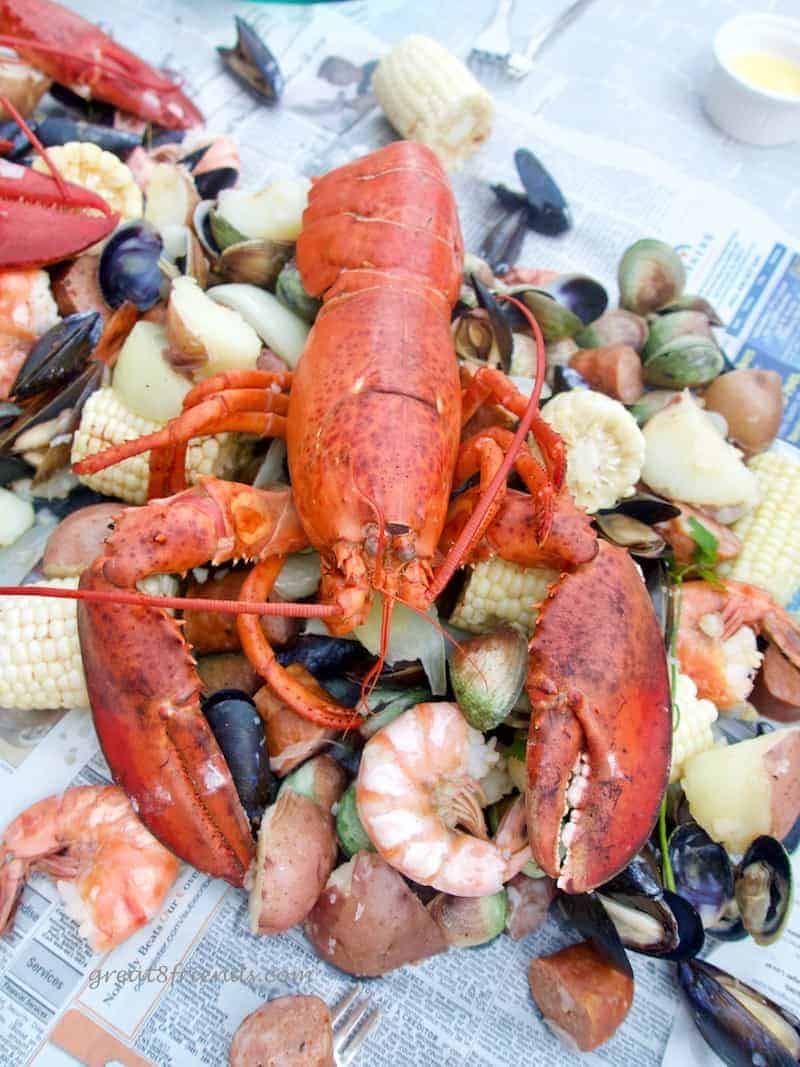 This Clambake on the Grill feeds a crowd and is an easy, casual summertime meal. And the mound of food in the middle of the table is impressive!