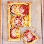 Enjoy this delicious and Tasty Tomato Onion Tart as an appetizer or side dish. The addition of fresh tomatoes and herbs makes this a flavorful tasty recipe.