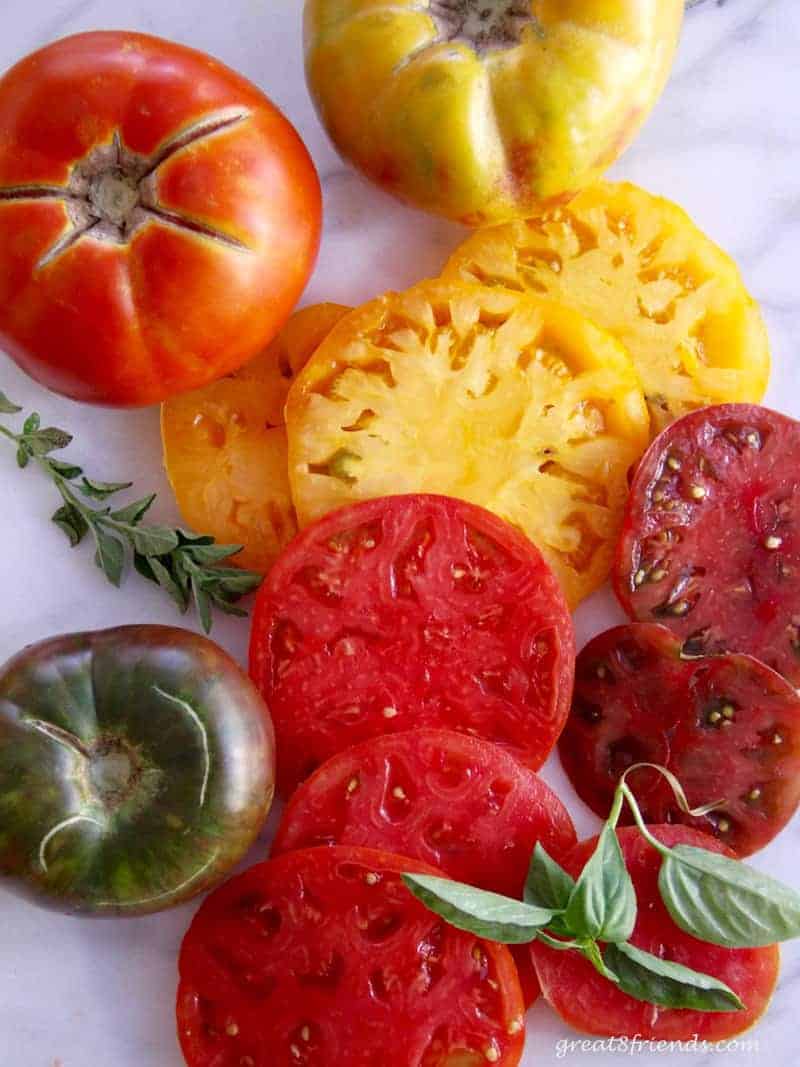 Unclose photo of fresh cut heirloom tomatoes.