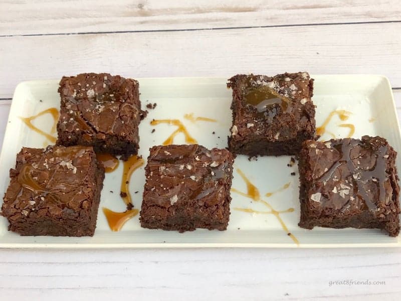 5 Salted Caramel Brownies on a rectangular tray.