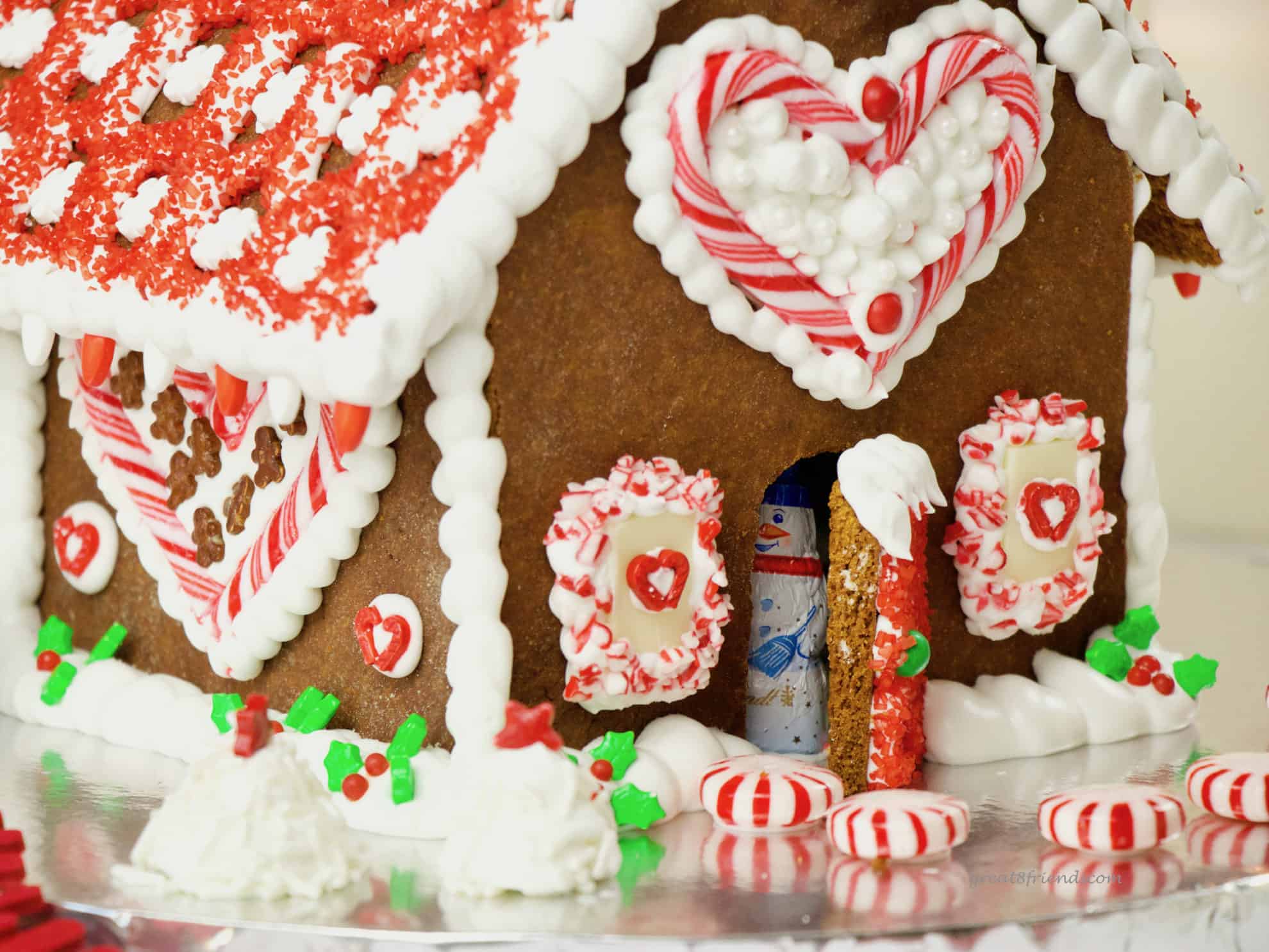 This festive Gingerbread House is a fun craft for your friends and family. Make this DIY edible Christmas decoration and delight the kids in your life.
