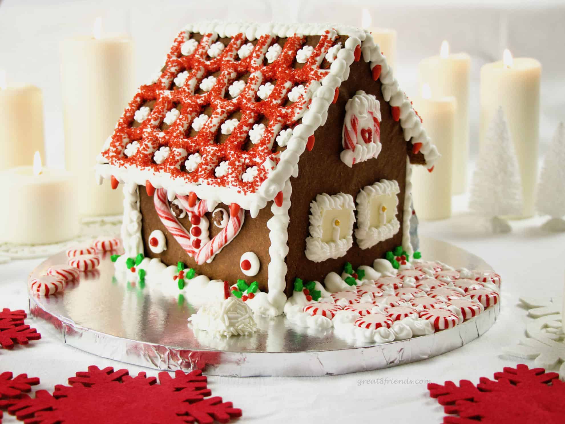 Don't buy a kit, add whimsy and fun to your Christmas by making this DIY Festive Gingerbread House! All the instructions right here.
