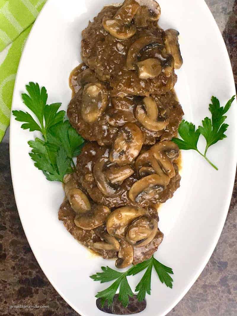 This Salisbury Steak with Mushroom Onion Gravy is the perfect melding of flavors and a comfort food that is a hit every time!