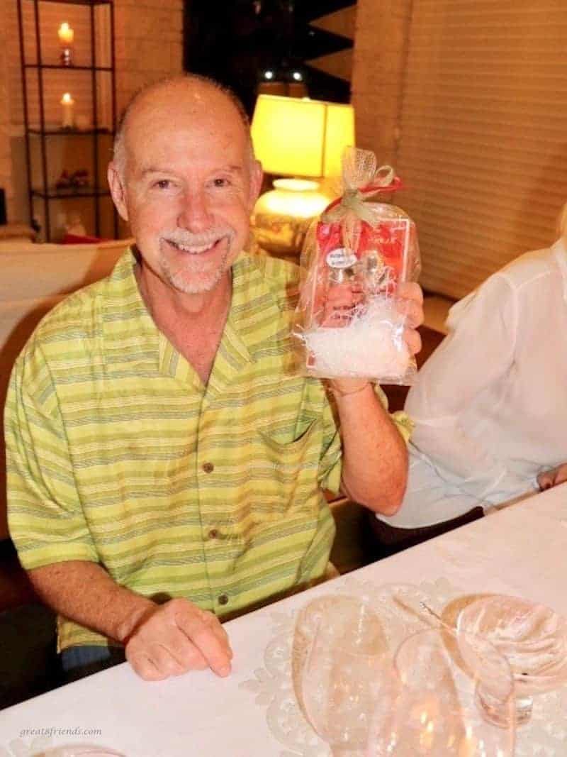 A man holding a marzipan pig.