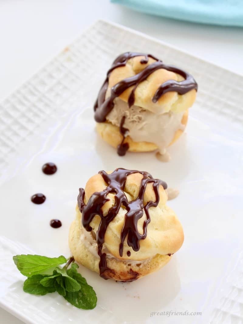 Profiteroles often served as cream puffs are also delicious with coffee ice cream and chocolate sauce. Impress your guests with this elegant dessert that is very easy to prepare!