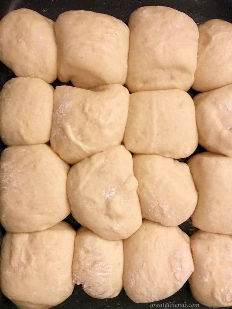 Hawaiian Bread Rolls rising on a baking sheet before baking.