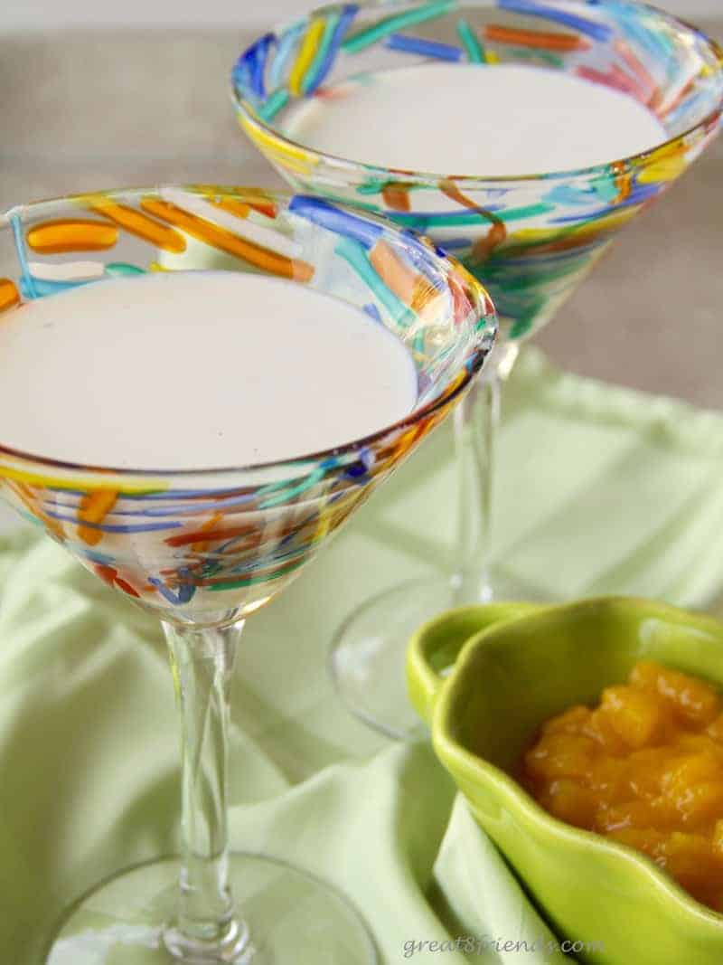 Impress your guests with this Vanilla Panna Cotta with Mango Compote. It is an unbelievably easy dessert to prepare, tasting much like a vanilla pudding with a bit of fresh fruit sweetness on top.