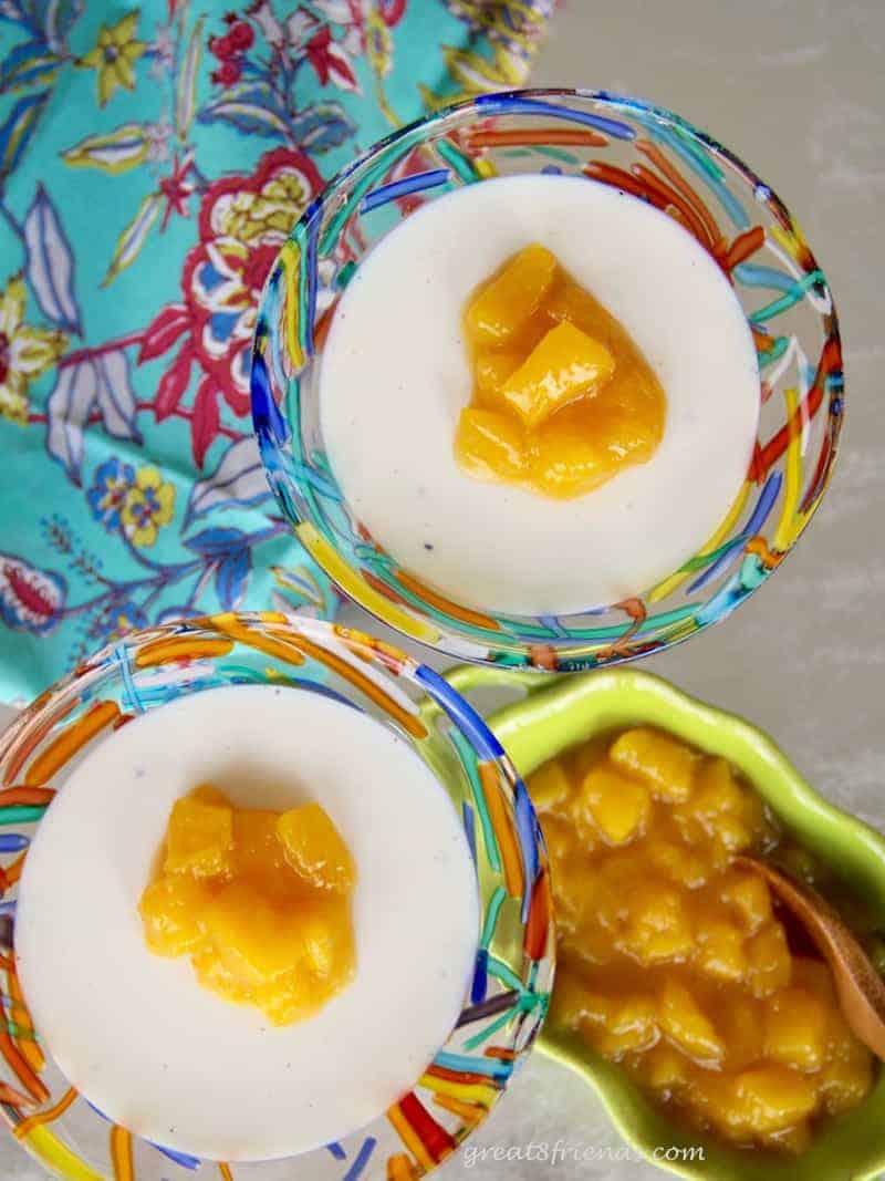 Impress your guests with this Vanilla Panna Cotta with Mango Compote. It is an unbelievably easy dessert to prepare, tasting much like a vanilla pudding with a bit of fresh fruit sweetness on top.