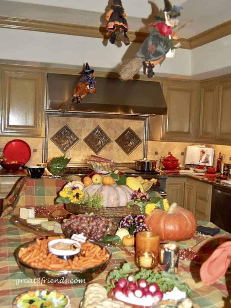 The buffet, with toy witches flying over.