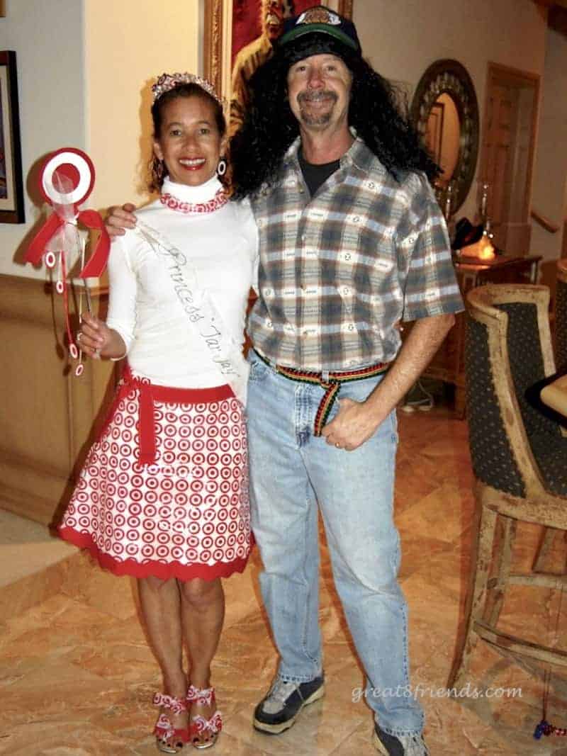 Debbie and Phil in costume. Debbie is Princess Tar-jay, with a skirt made of Target bags. Phil is wearing a long black wig and flannel shirt.