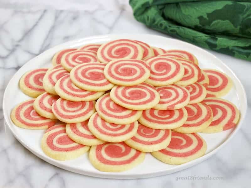 Peppermint Pinwheel Cookies on a white tray.