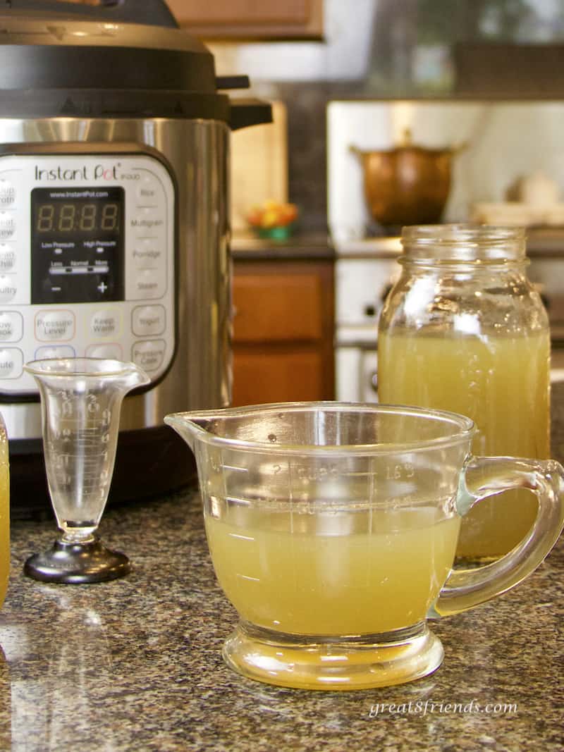 Instant Pot Chicken Stock with Instant Pot in background