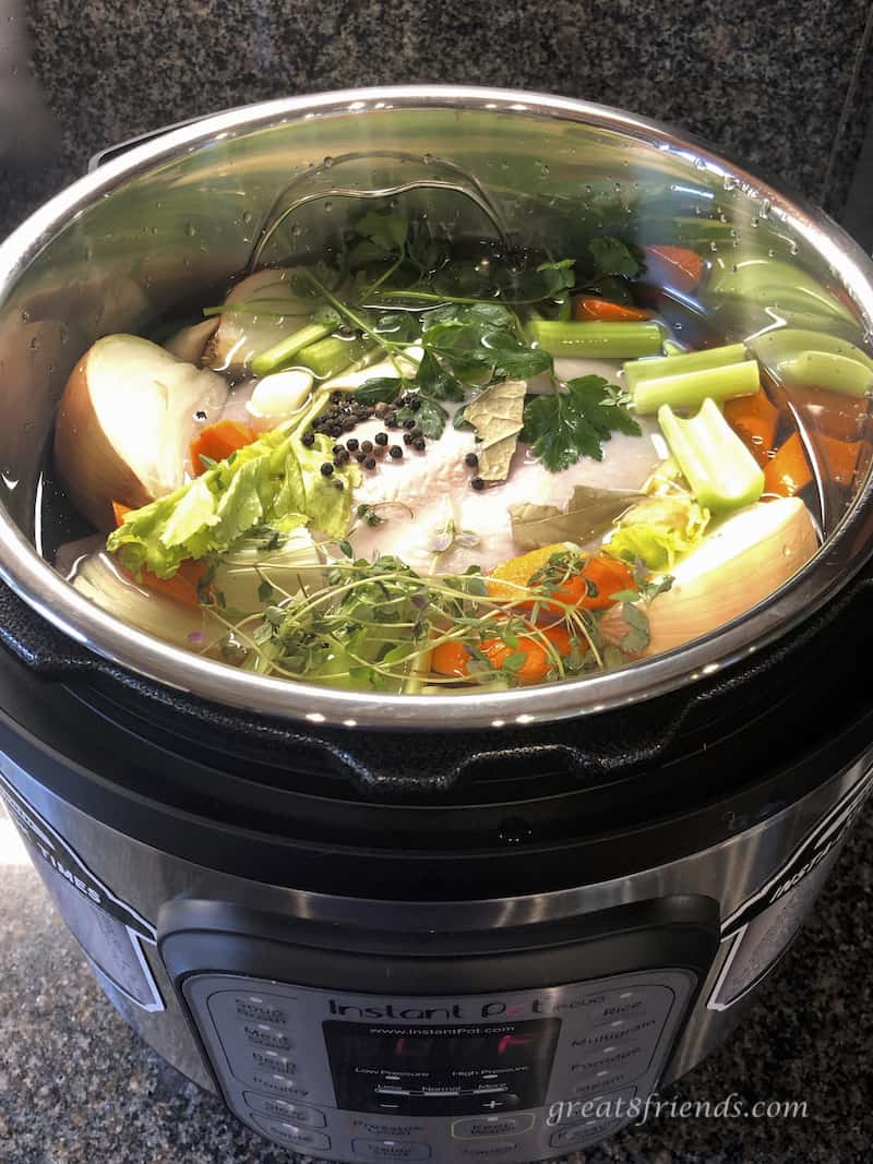 Chicken Stock ingredients in Instant Pot before cooking